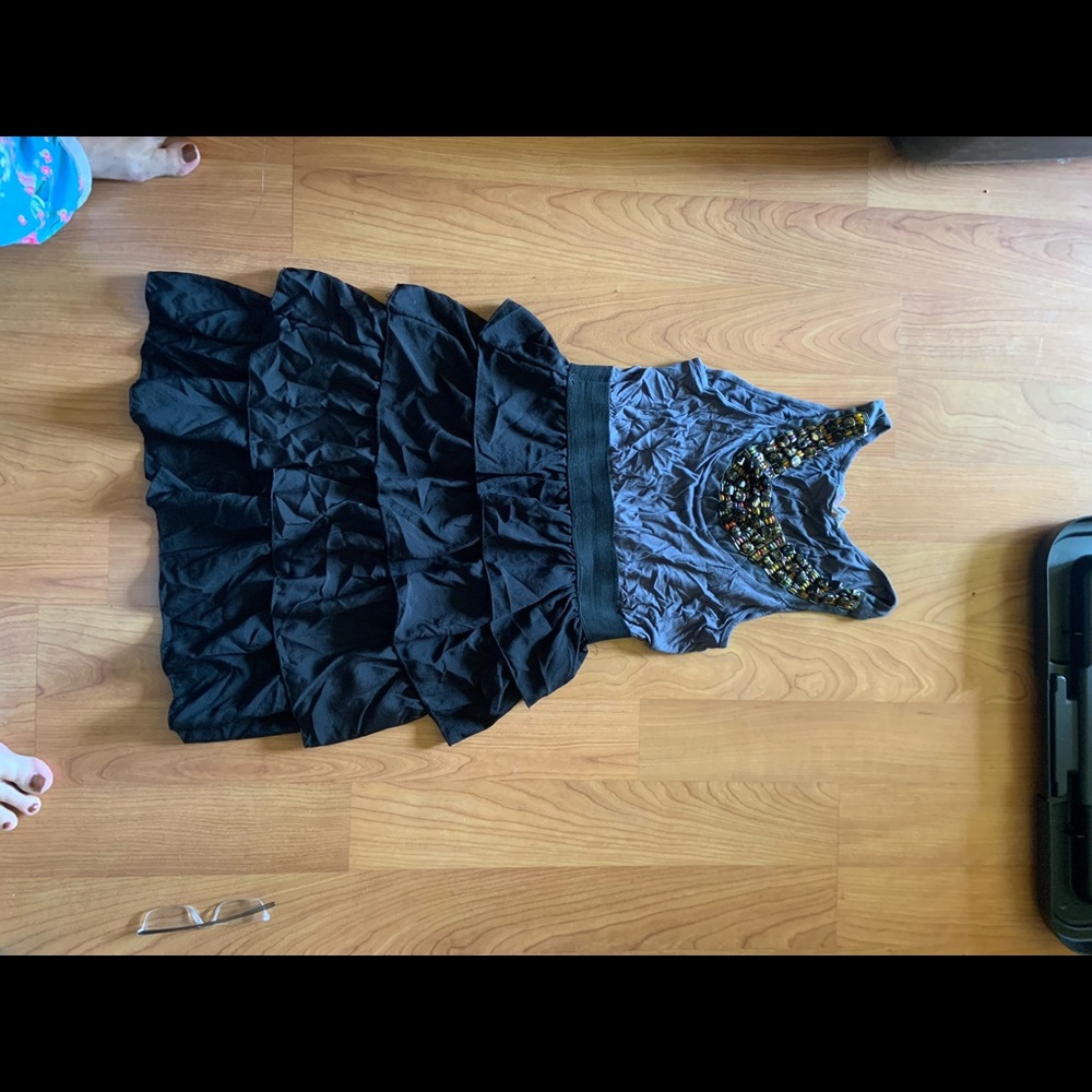 Adorable black dress with beaded collar